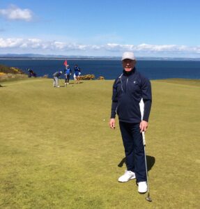 Glenn Barrett CEO of OrthoLite on a golf course