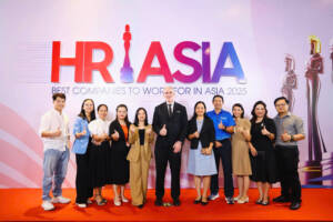 Mark Coffield, Country Manager for OrthoLite Vietnam accepts award alongside OVN team